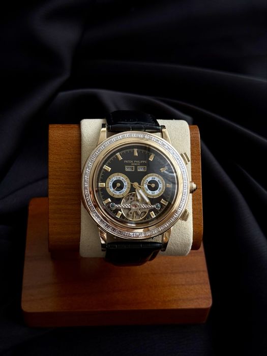 Золотые часы Patek Philippe 585
