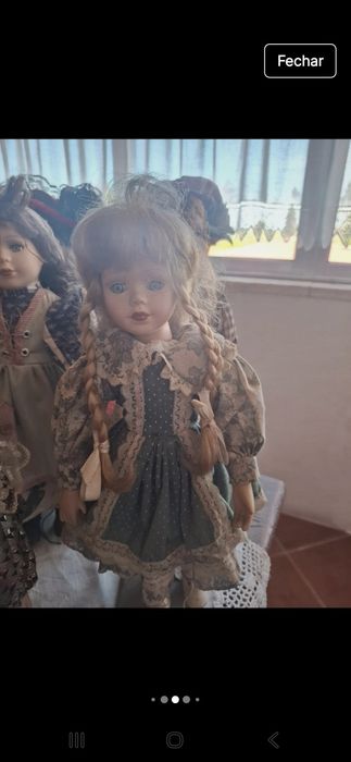 Bonecas em porcelana