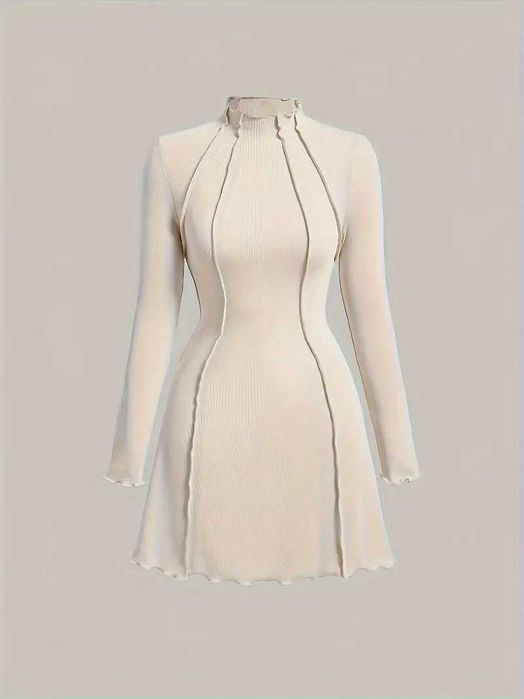 Жіноча облягаюча сукня в рубчик