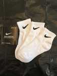 9 par skarpet Nike z czystego bawełny. Białe, krótkie, Rozmiar M/L