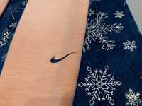 Brzoskwiniowe legginsy sportowe Nike rozmiar XS damskie