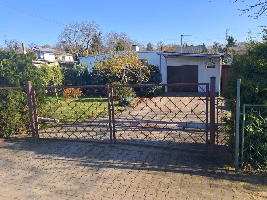 Sprzedam dom w Poznaniu z garażem i warsztatem