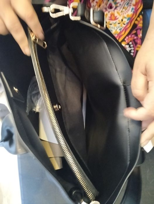 Mala guess  tiracolo e maos