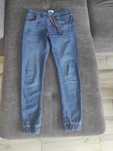 Joggery niebieskie rozmiar 28/32
