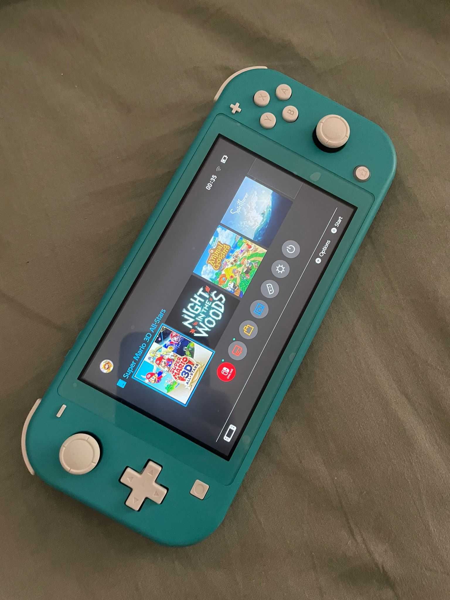 Nintendo Switch Lite + mala & jogos!