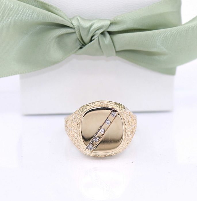 Złoty sygnet p.585/15,38g z brylantami