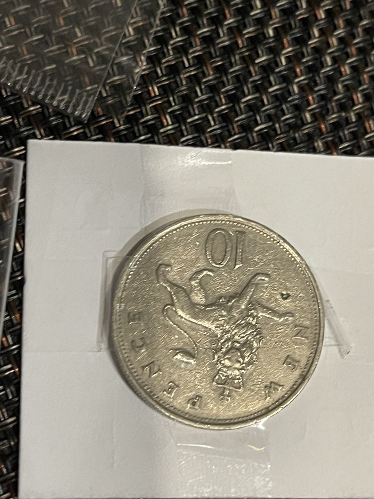 7 moedas do Reino Unido diferentes datas