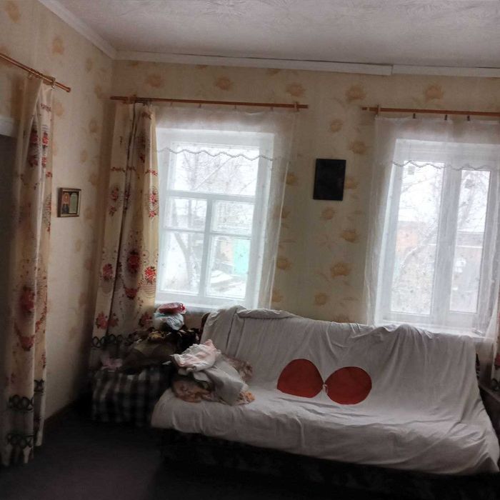 Продам дом с участком г. Ромны