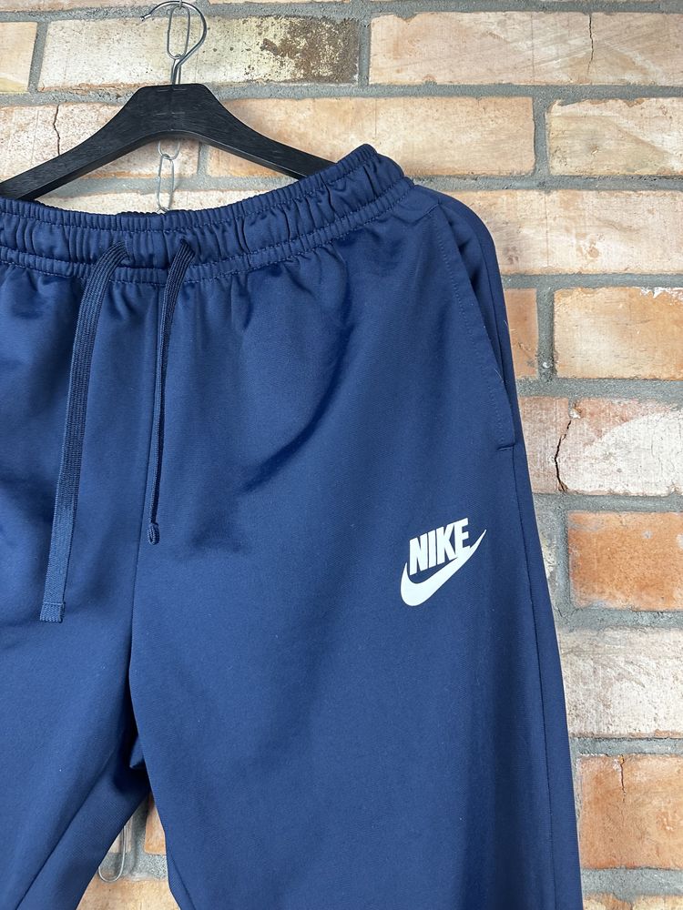 Синие штаны Nike