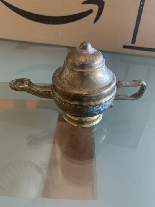 Objeto de mteal antigo