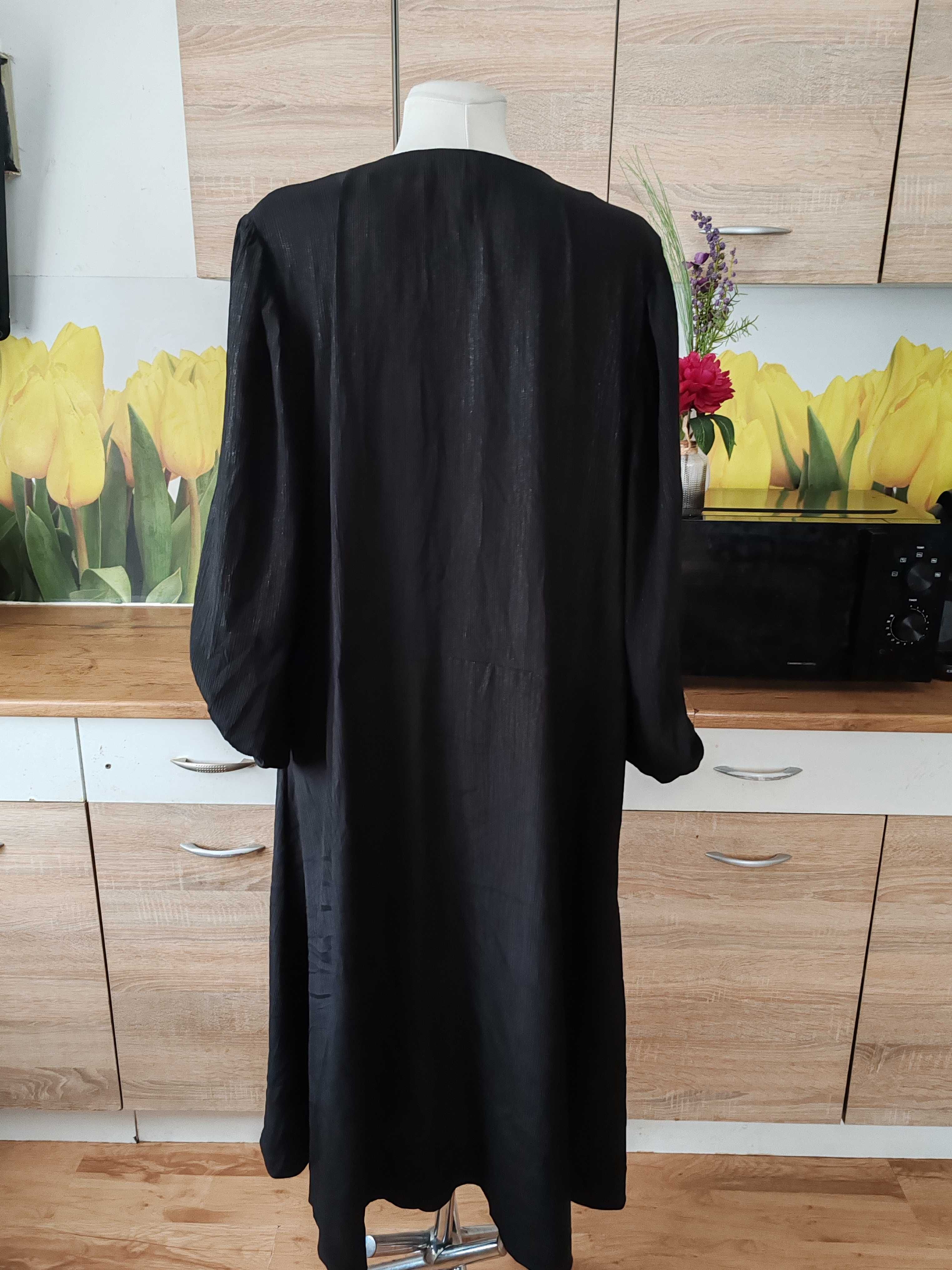 Ciekawa lekka koktajlowa sukienka H&M rozmiar ok 50 poliester