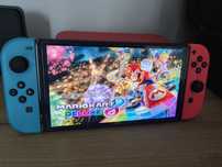 Nintendo Switch OLED stan bardzo dobry + gra Mario Kart 8 + akcesoria