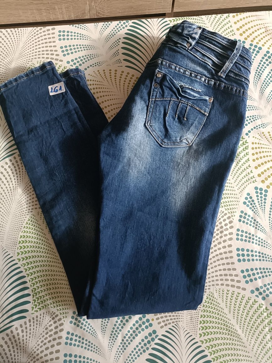 Spodnie jeans damskie rozmiar L . Niski stan