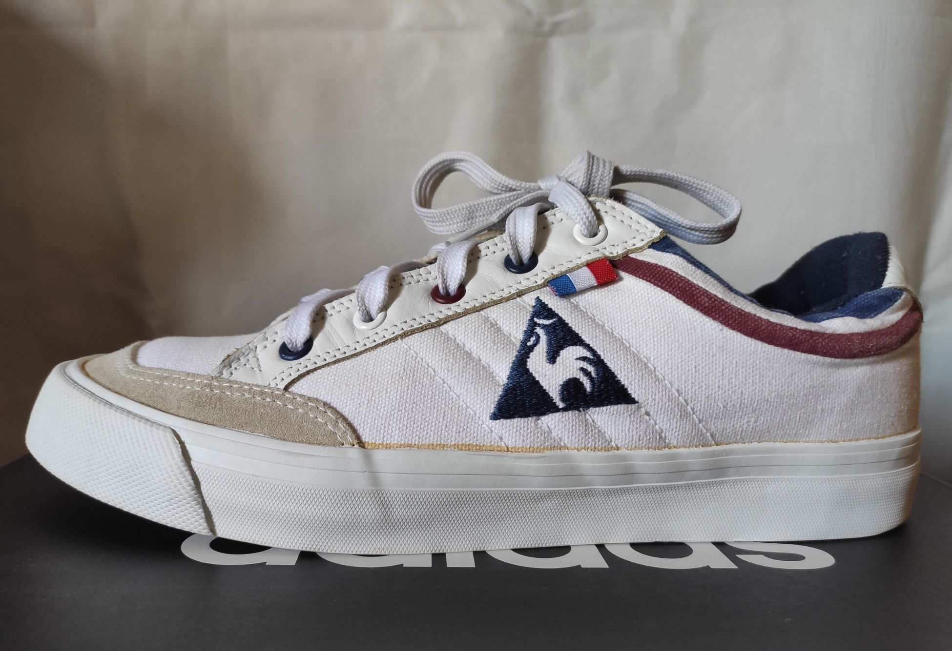 Białe tenisówki le coq sportif