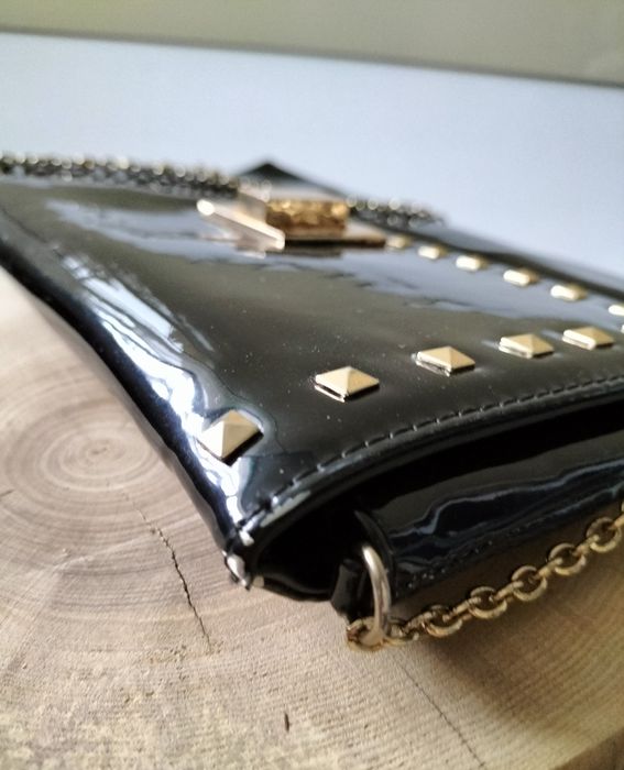 Torebka kopertówka Dune czarna ćwieki złoto