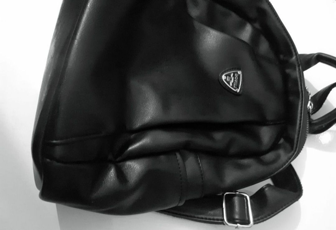 Чорний шкіряний якісний рюкзак