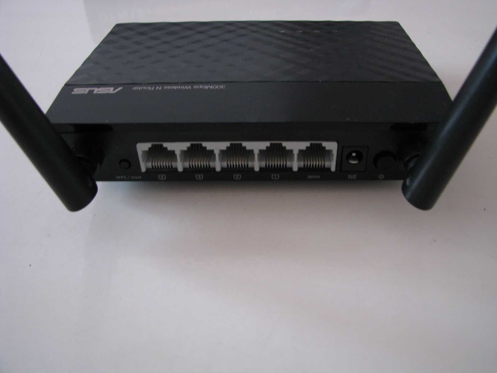 Router ASUS RT-N12+ plus drugi router Actina P6803