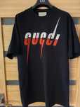 Koszulka Gucci. Motyw logo Blade.