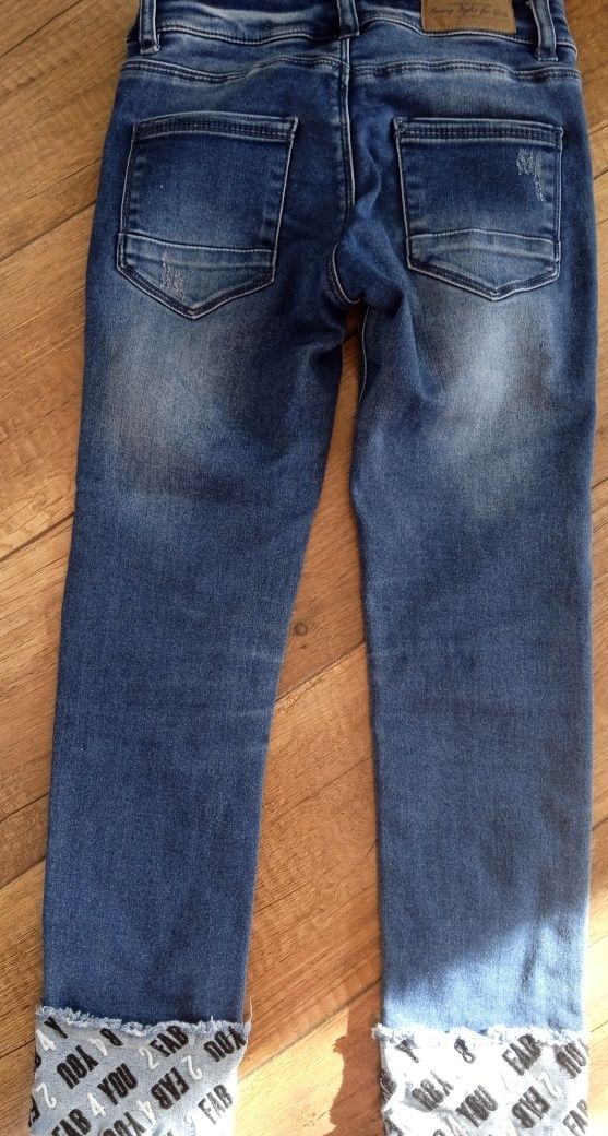 Spodnie jeans 134