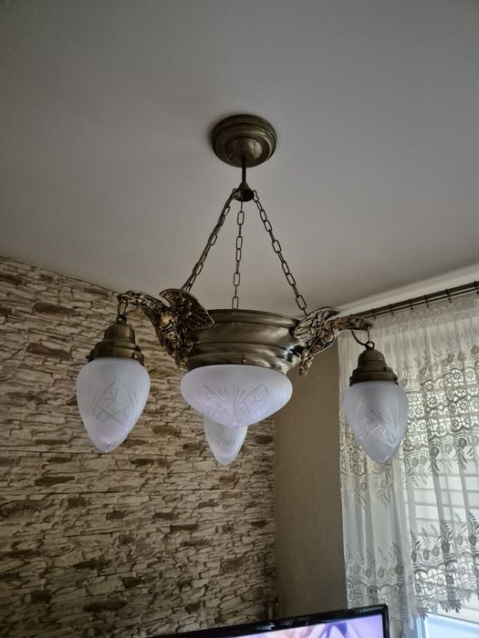 Żyrandol mosiężny z orłami