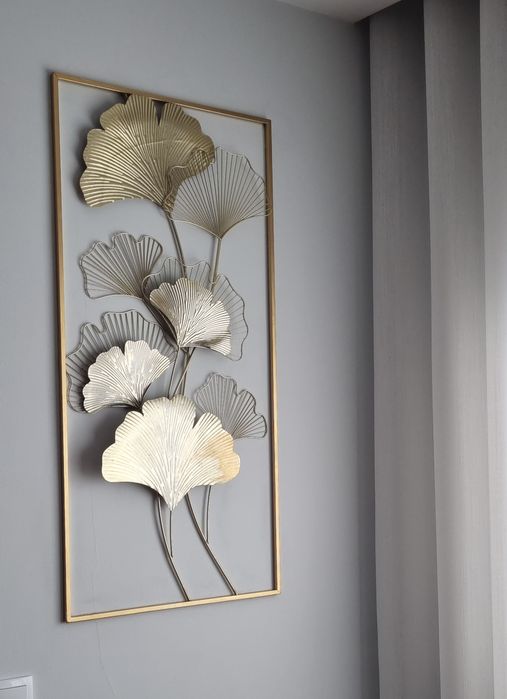 Quadro em metal dourado