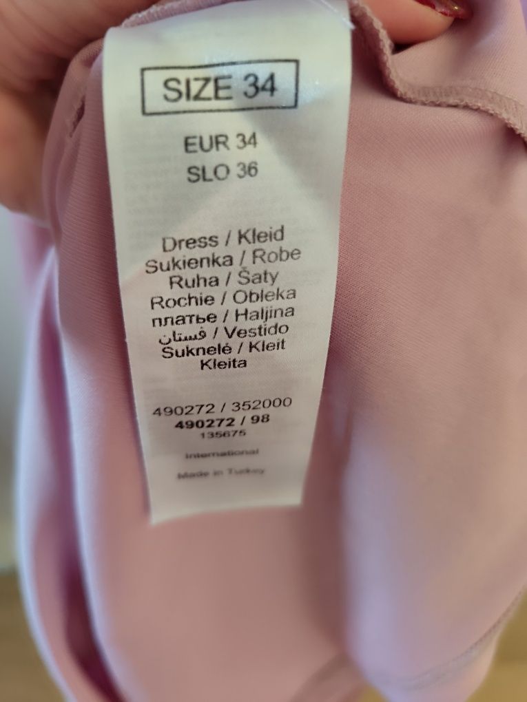 Sukienka ze stójką, sukienka koktajlowa, Orsay, sukienka z falbanami