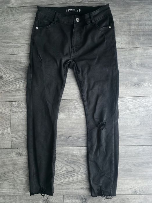 Elastyczne spodnie jeansowe skinny low waist W31