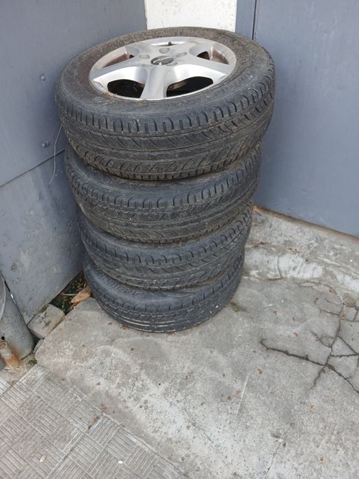 Диски з резиною на Touran r15