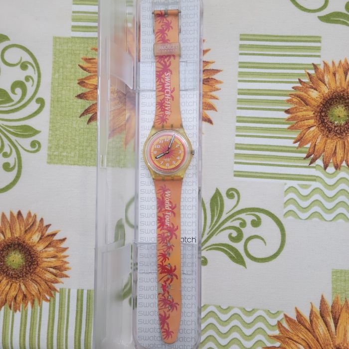 Relogio swatch laranja e vermelho