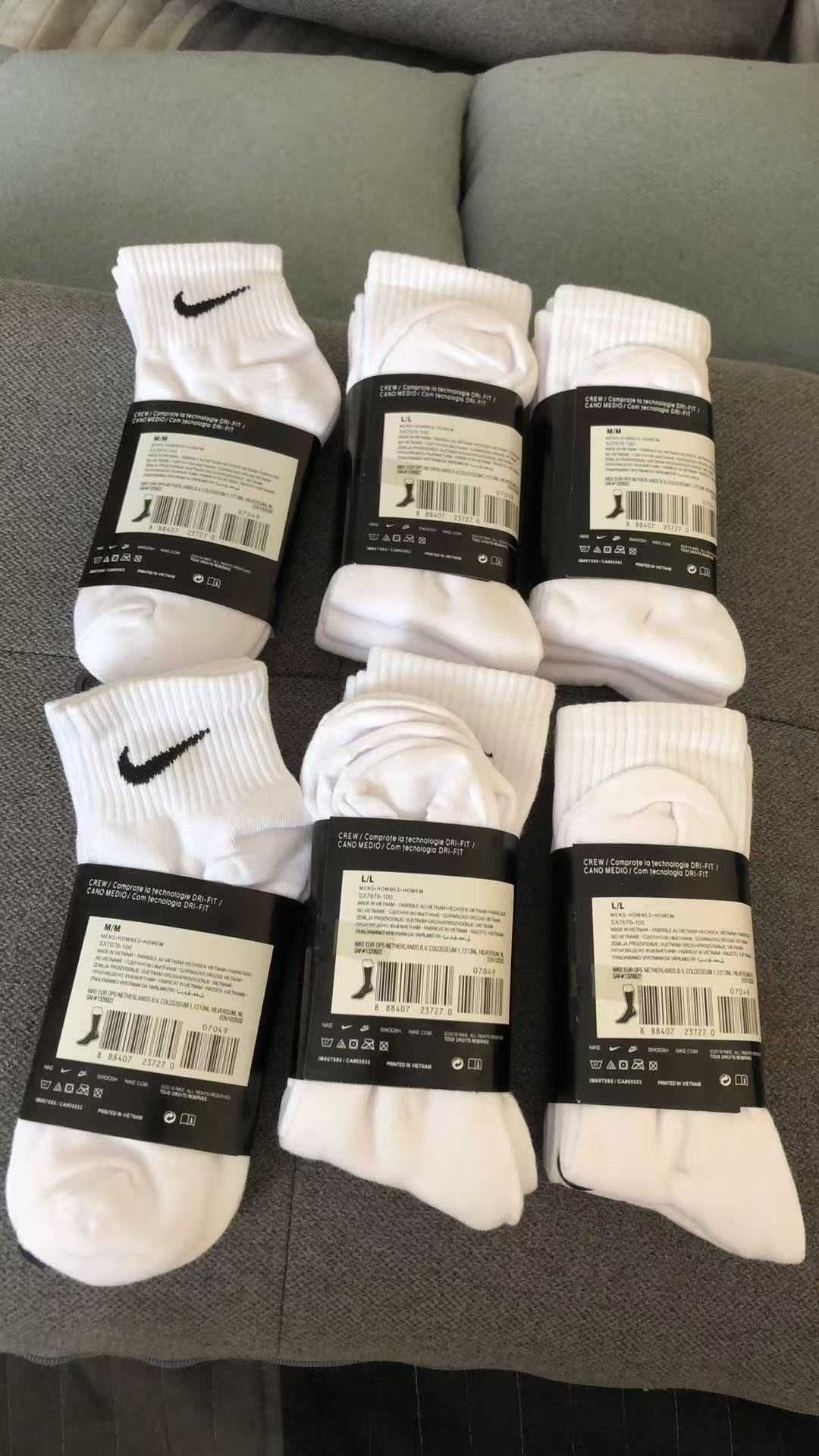 9 par skarpet Nike z czystego bawełny. Białe, krótkie, Rozmiar M/L