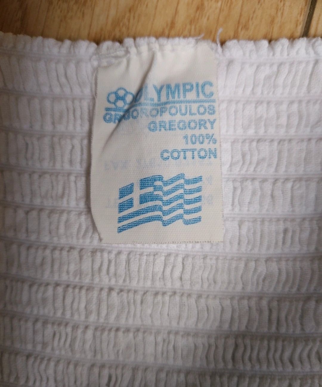 Biała bawelniana sukienka na ramiączkach odcinana pod biustem Olympic
