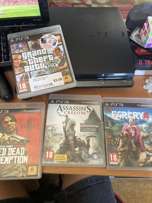 Consola ps3 com 4 jogos