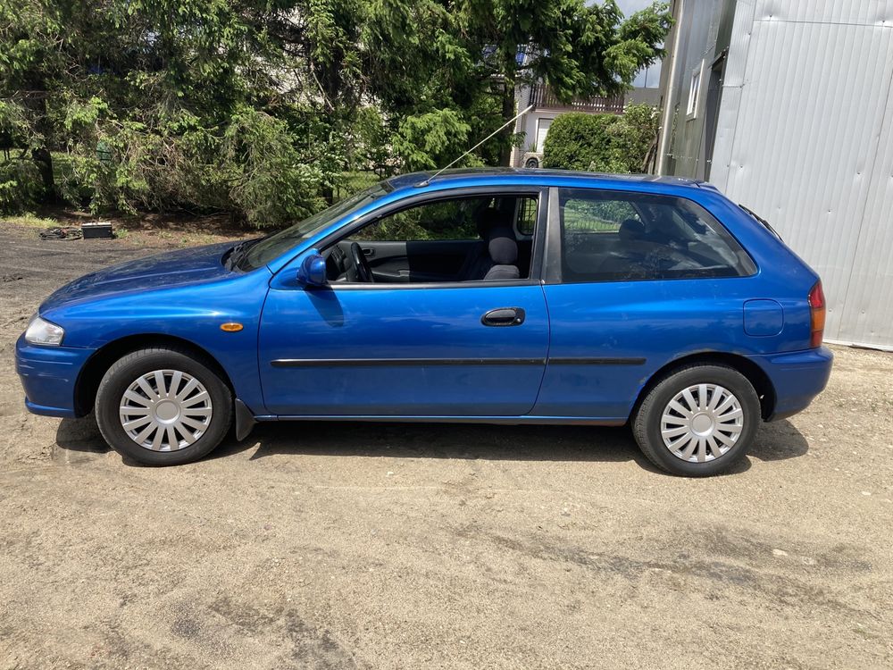 Mazda 323 1.5 65kw niski przebieg , elektryczny szyberdach