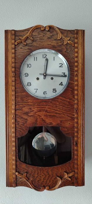 382 Zegar wiszący mechaniczny Urgos