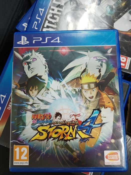 Playstation 4 c/comando e coleção incrível de jogos