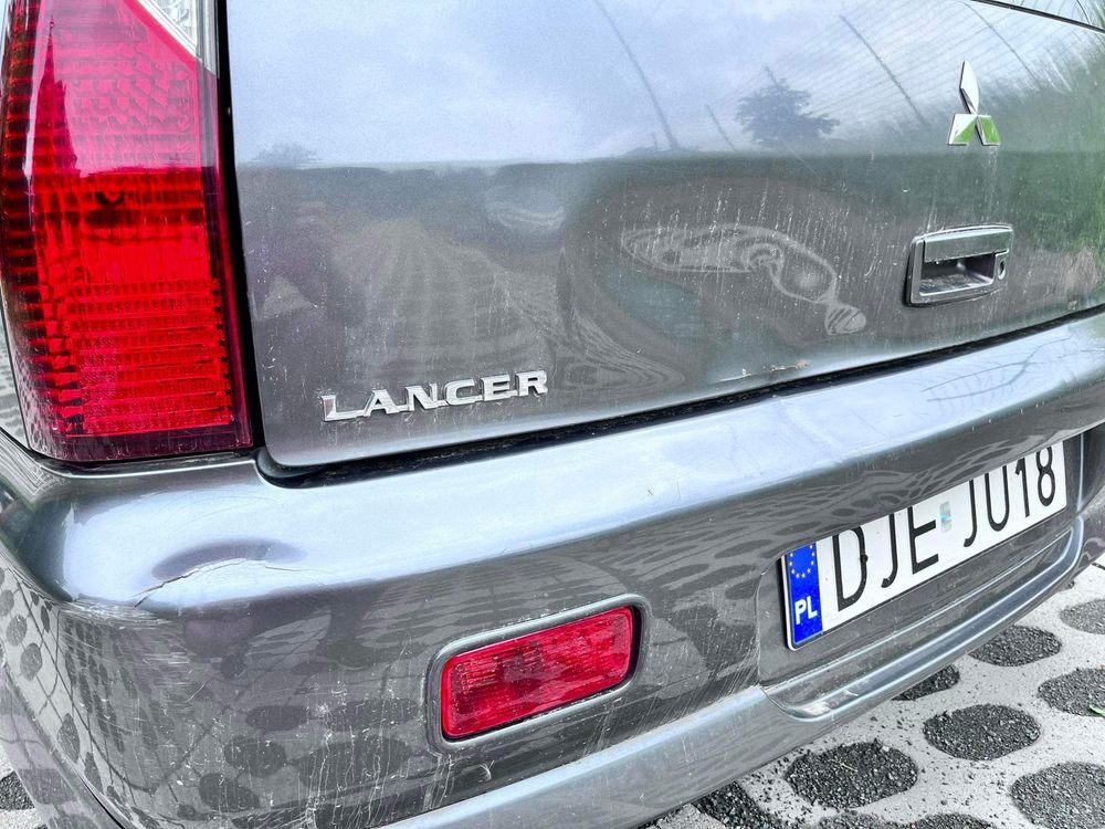 Mitsubishi Lancer 1.6  w pełni sprawny oplaty na rok czasu