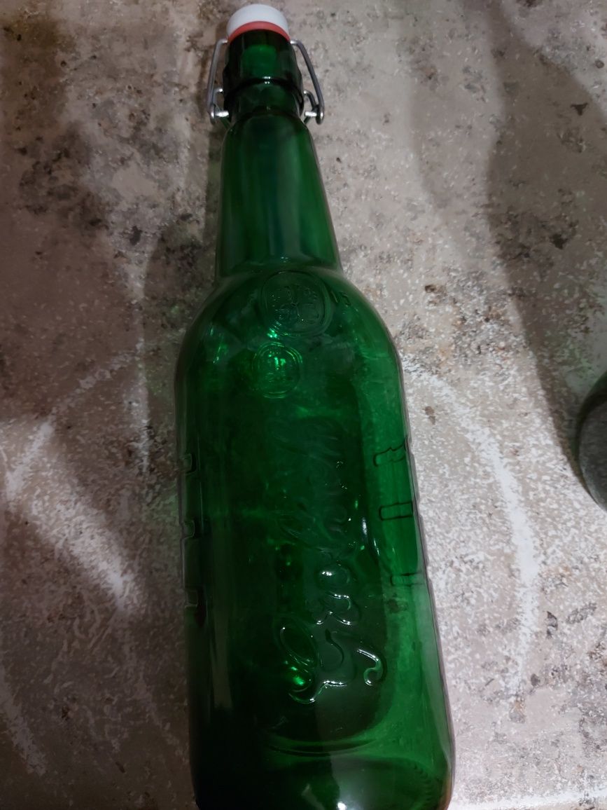 Butelki na soki 1.5 litra z zamknięciem pałąkowym