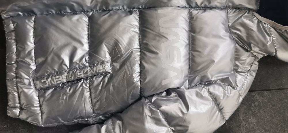 Kurtka srebrna NASA, metaliczna 134/140 zimowa z kapturem