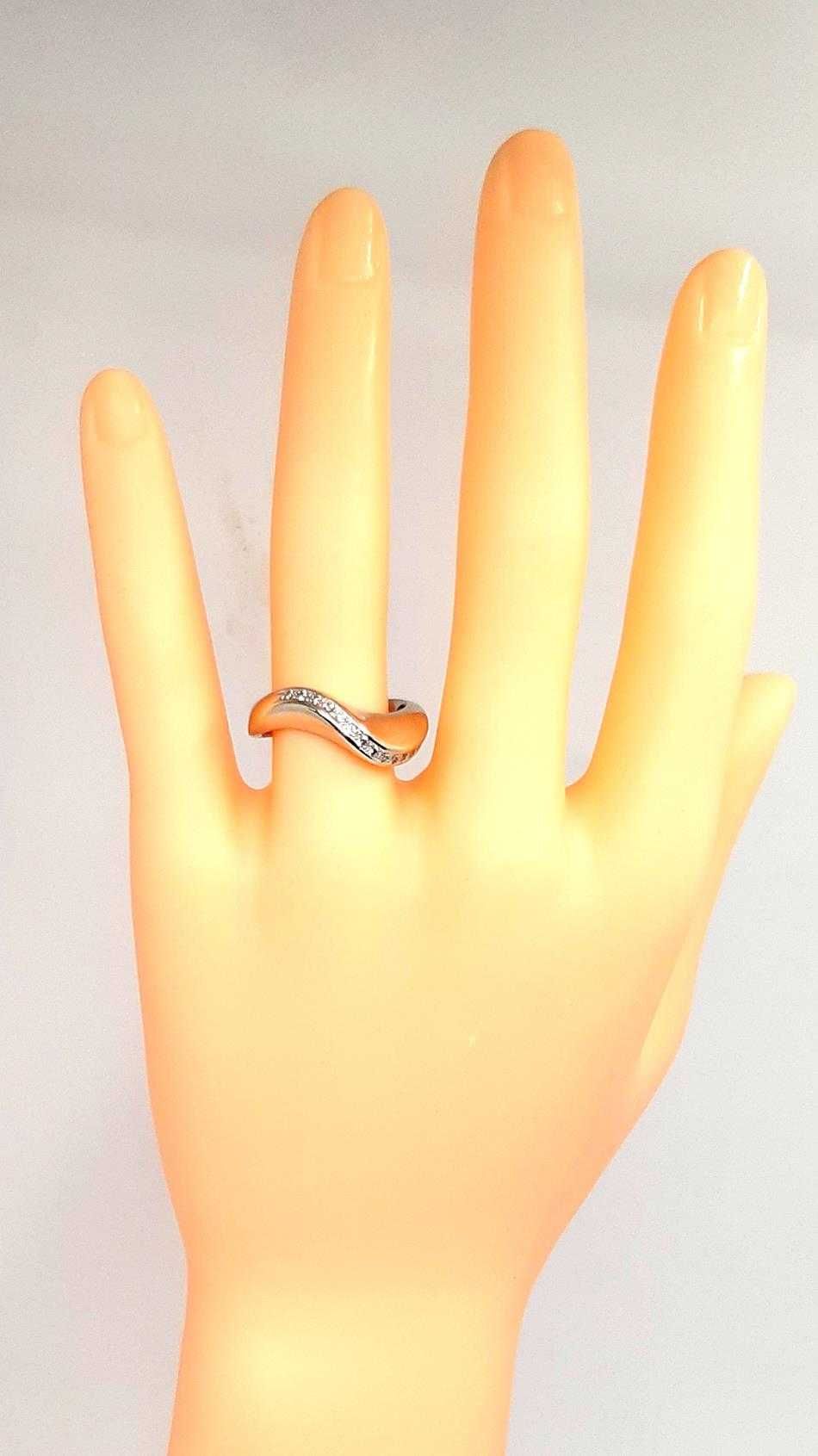 Złoty pierścionek z Diamentami 0,18ct PR.585 W:4,39gr R.15 InterSKLEP