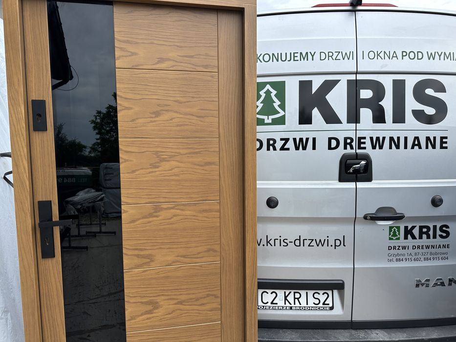 Drzwi zewnetrzne drewniane Montaż Cała Polska dębowe czarna szyba