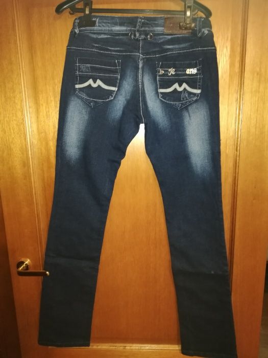 Granatowe jeansy - przecierki - rurki - biodrówki rozm. 40/L