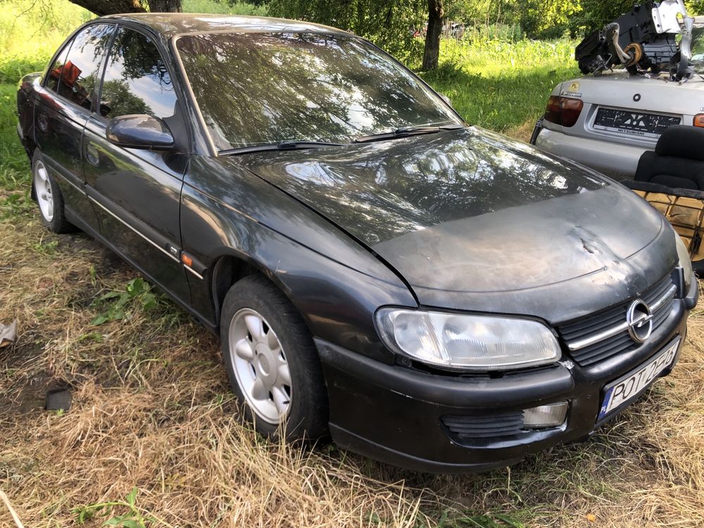 Разборка Opel Omega B 2.5tds салон дверь бампер стекло фары ксенон