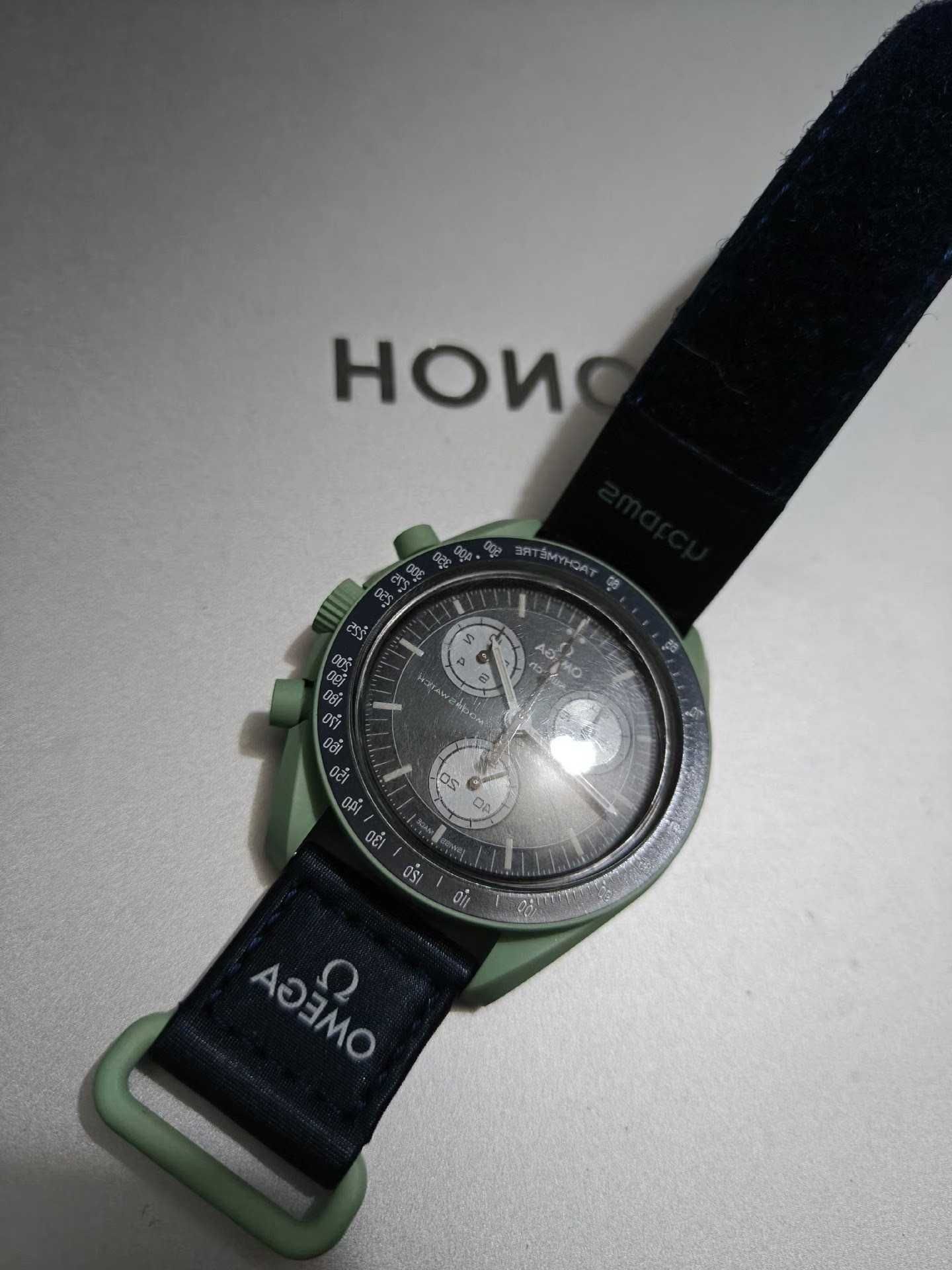 Omega Swatch Ziemia SO33G100 - zegarek do codzienności