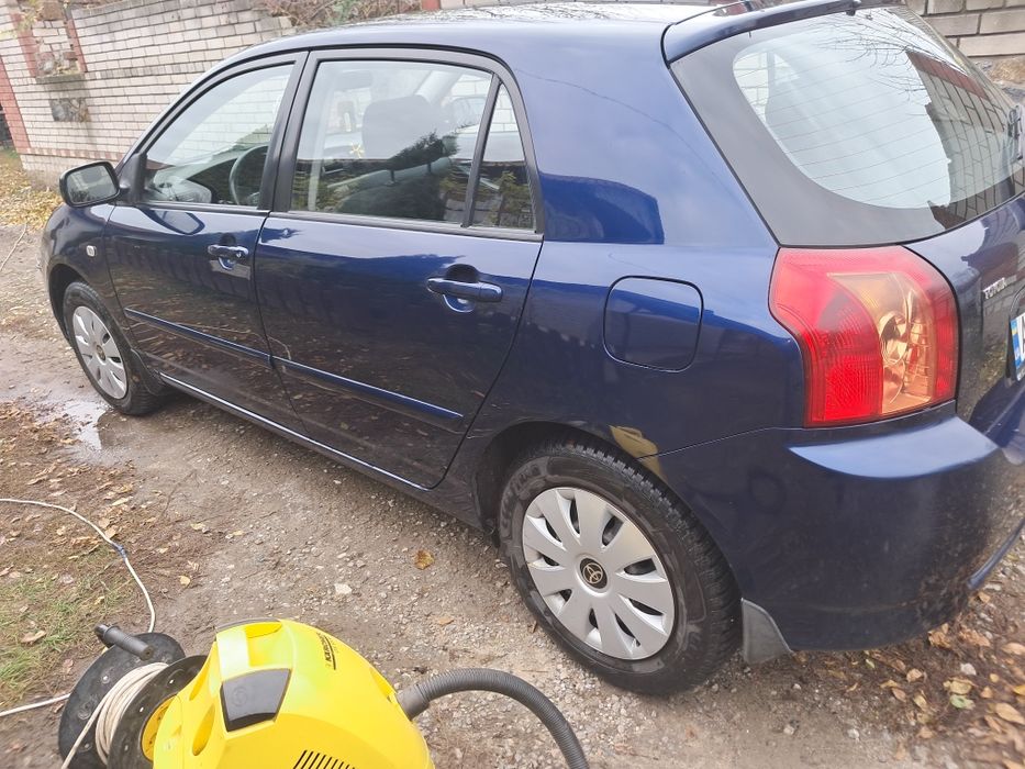 Тойота корола е120