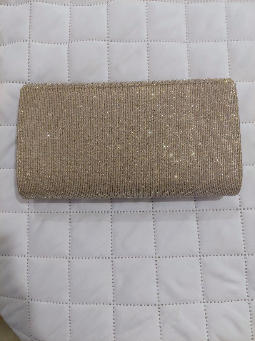 Clutch dourada NOVA