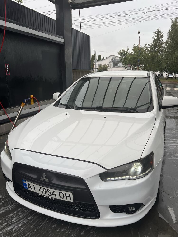 Mitsubishi Lancer 2012 • 1.6 МКПП ГАЗ/БЕНЗИН