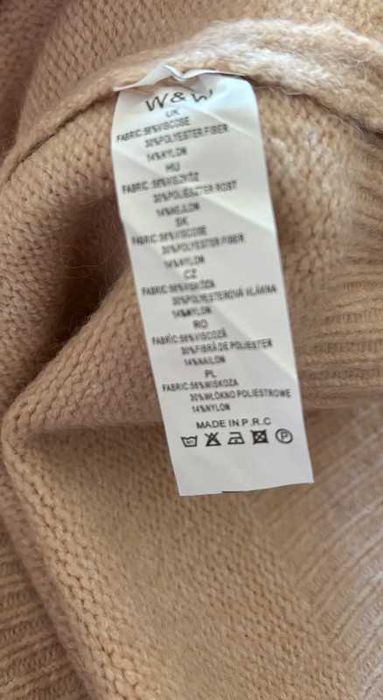 Sweter damski z wiskozą i cekinową kokardą, elegancki