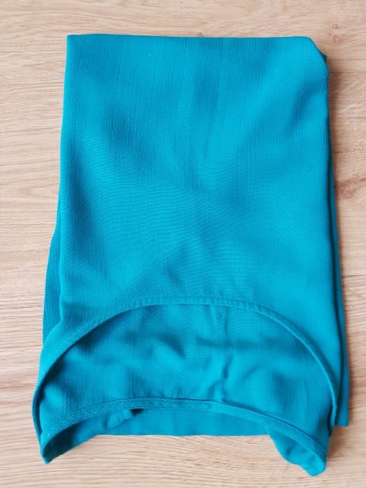 Turkusowa bluzka bez rękawow rozm 48/50