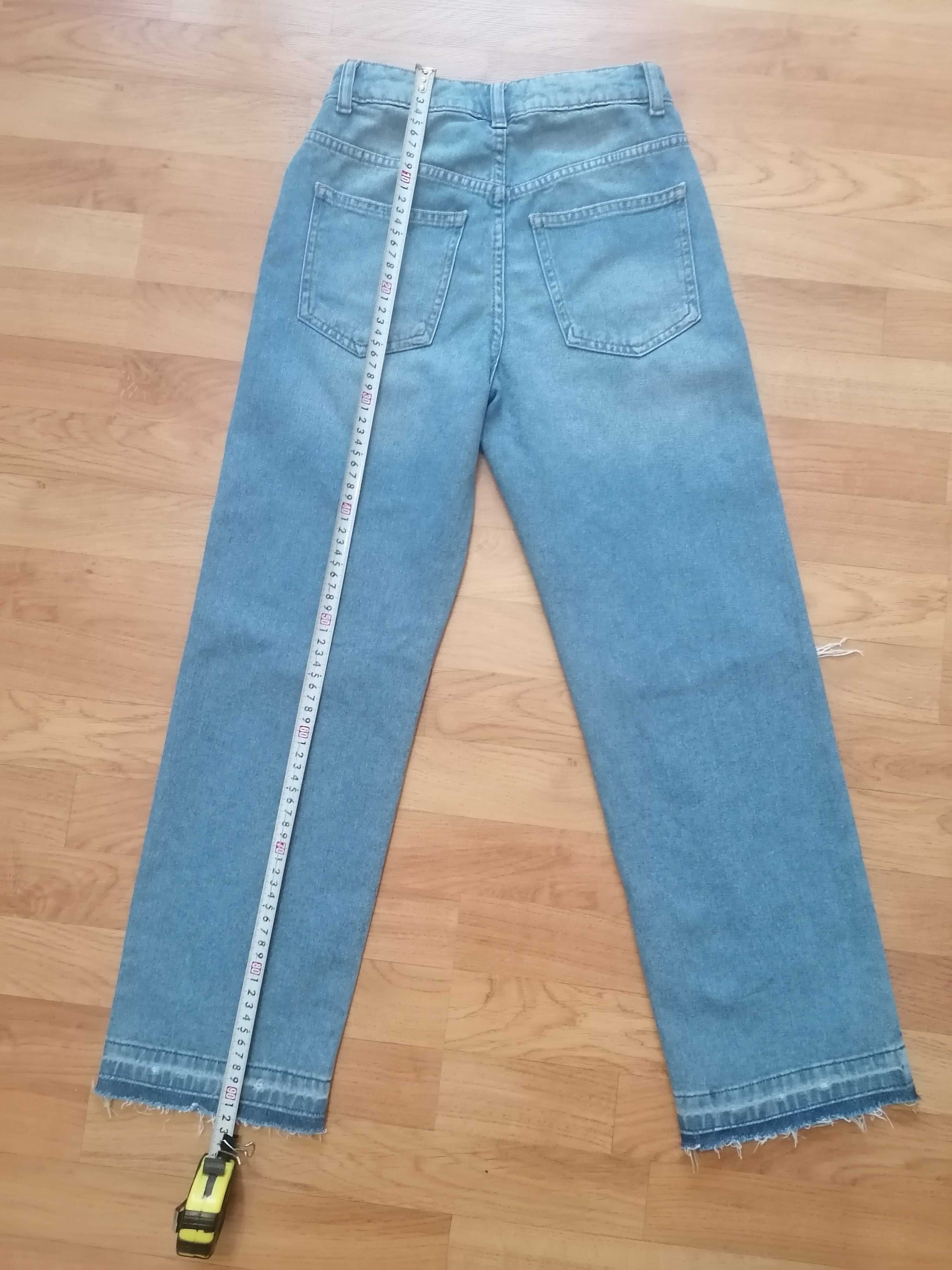146/152 Reserved jeansy z dziurami, dziewczynka.