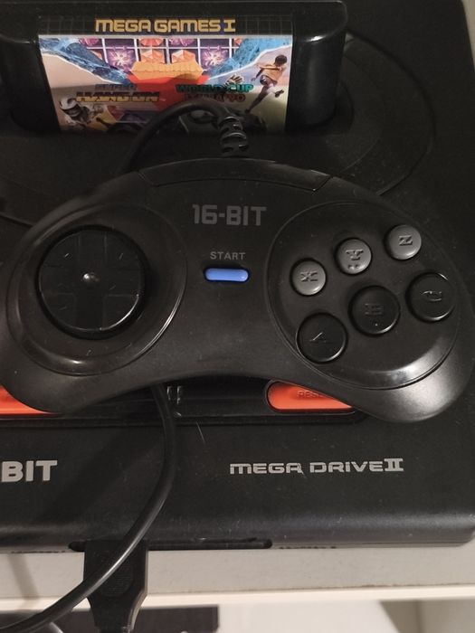 Mega drive, 2 comandos e 1  jogo
